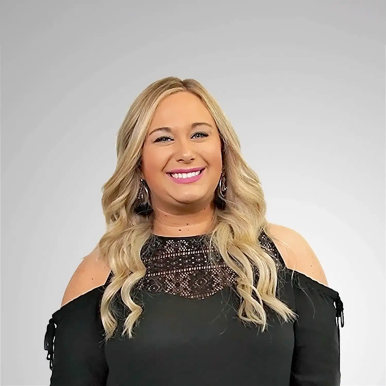 Portrait of Sandra, a professional stylist at Prestige Beauty & Wellness by Meevo, showcasing their expertise and style.