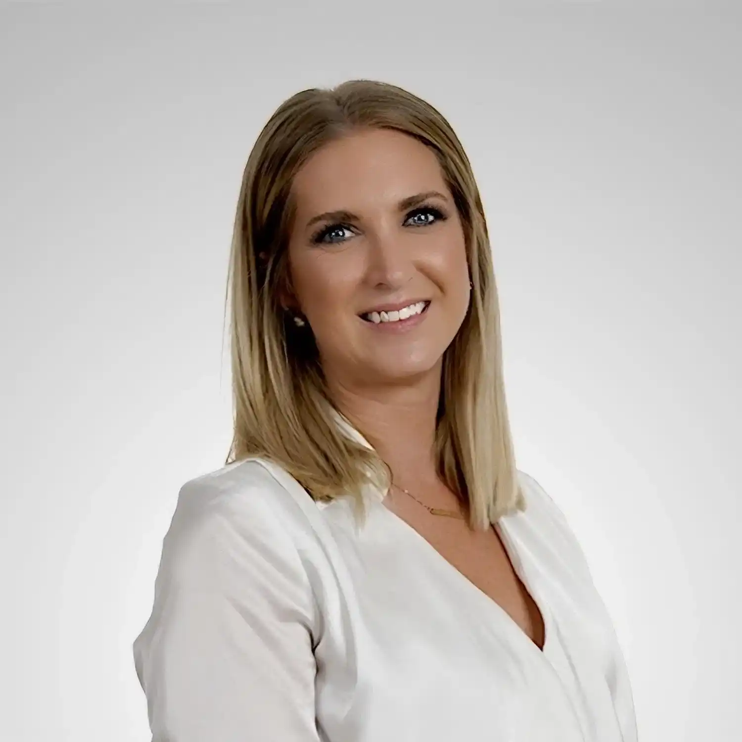 Portrait of Jenna, a professional stylist at Prestige Beauty & Wellness by Meevo, showcasing their expertise and style.