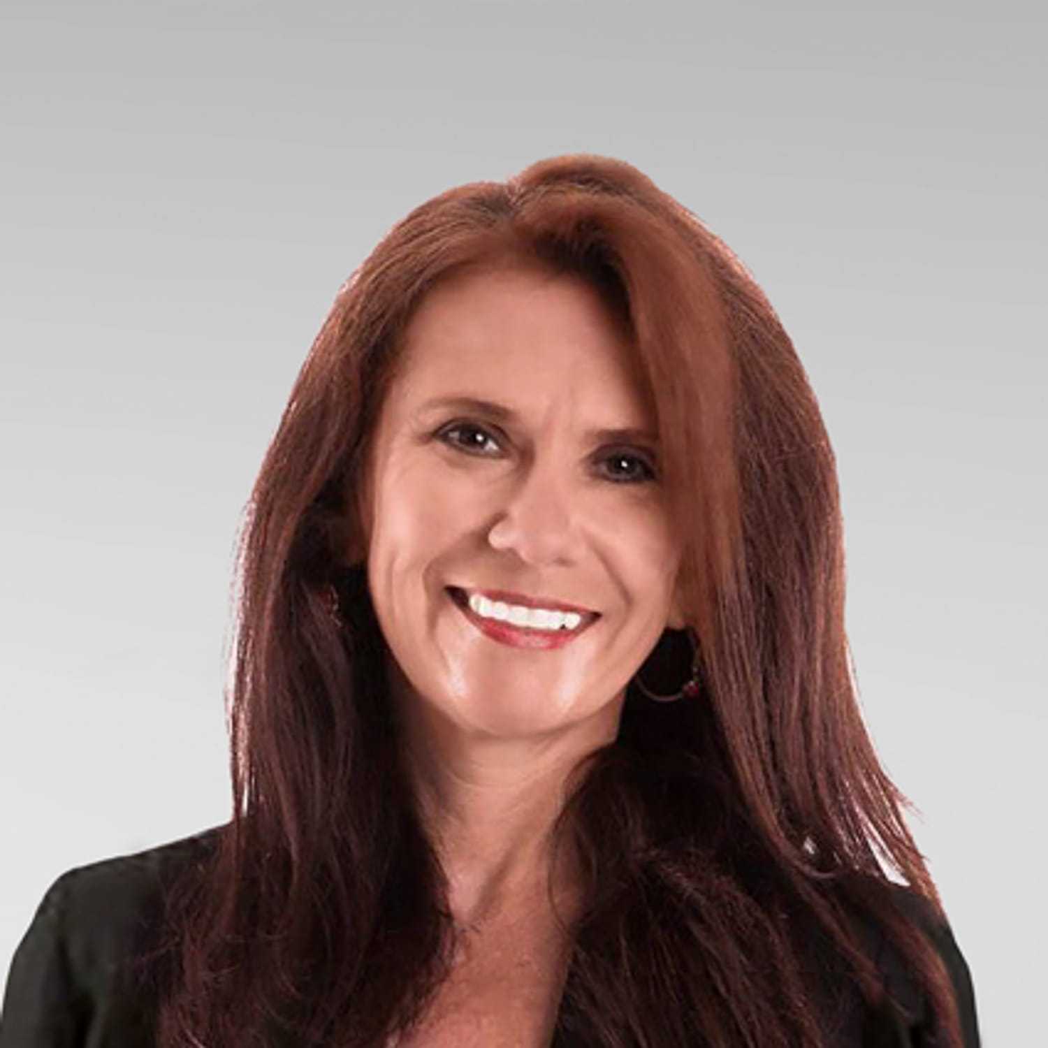 Portrait of Monica, a professional stylist at Prestige Beauty & Wellness by Meevo, showcasing their expertise and style.