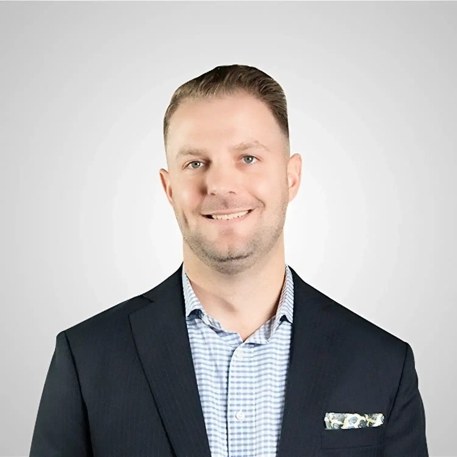 Portrait of Mark, a professional stylist at Prestige Beauty & Wellness by Meevo, showcasing their expertise and style.